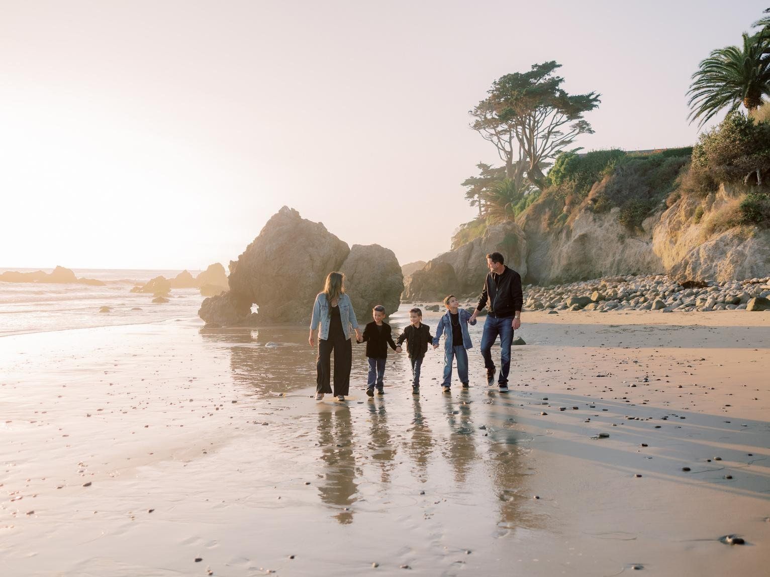 Family laughing together in golden light, fall mini session in Los Angeles