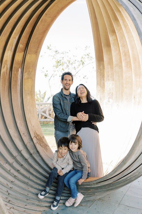 Family inside a curved sculpture in Palisades Park, Santa Monica